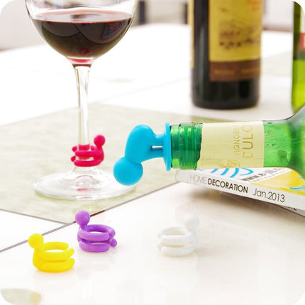 7 PCS Cartoon Silicone Sealed Spiral Red Wine Stopper + Cup Feet Set, Random Color Delivery - DealBuddy